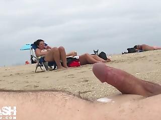 Hairy naked handjob cock on beach