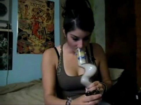 Topless wife smoking joint