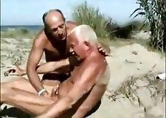Twink yellow lick penis on beach